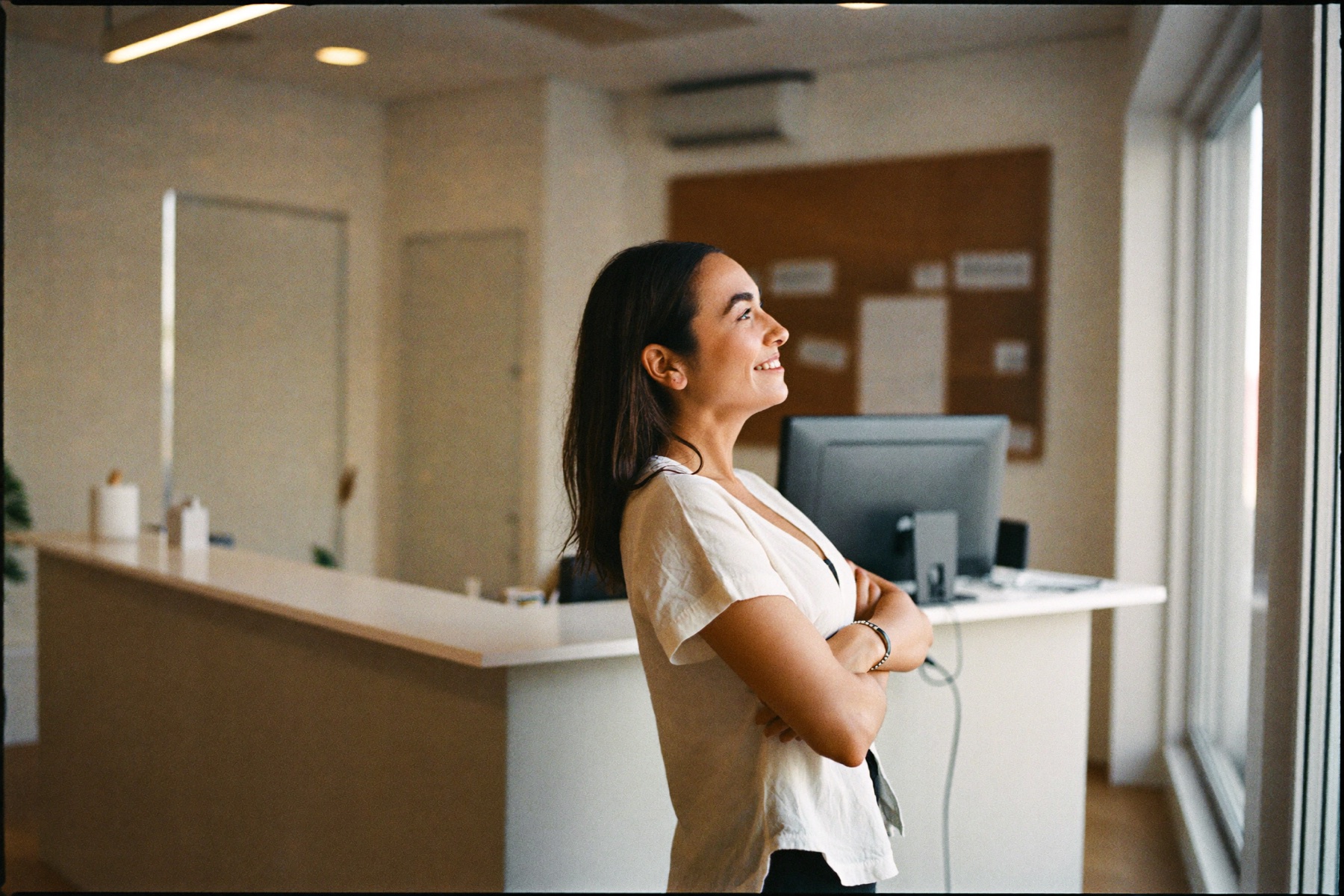 A happy business owner in her clinic